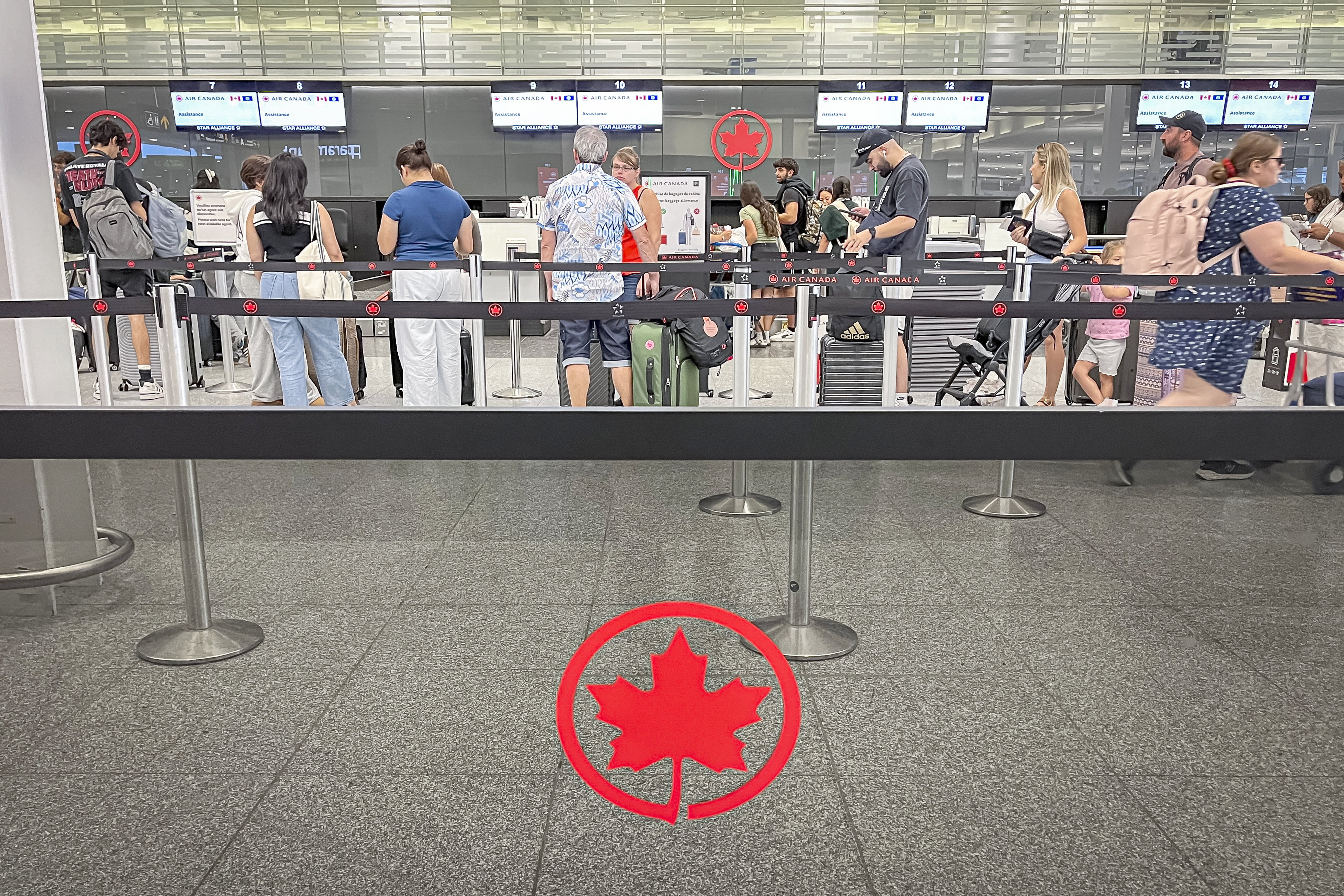 GEN-AIR-CANADA It was calm before the storm on Thursday at Montreal airport. air canada conflict: 25,000 canadian new
